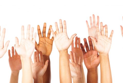 multi-ethnic young adults' hands